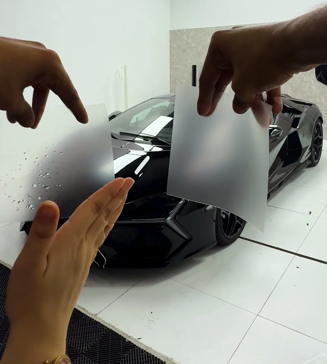 Matte film samples shown beside the Revuelto at WrapME